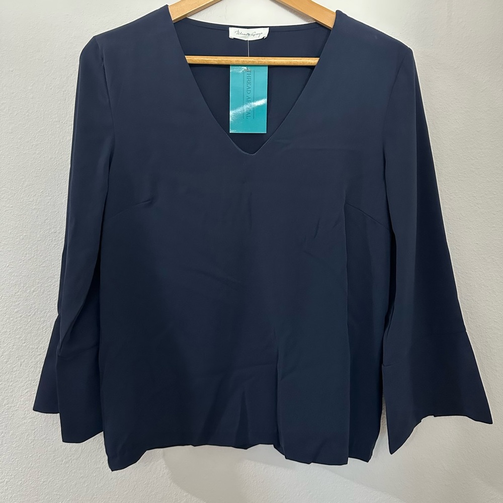 Deep blue dress shirt with flare at wrist